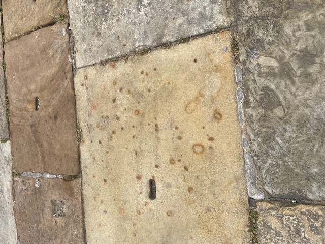 Natural rusting on paving